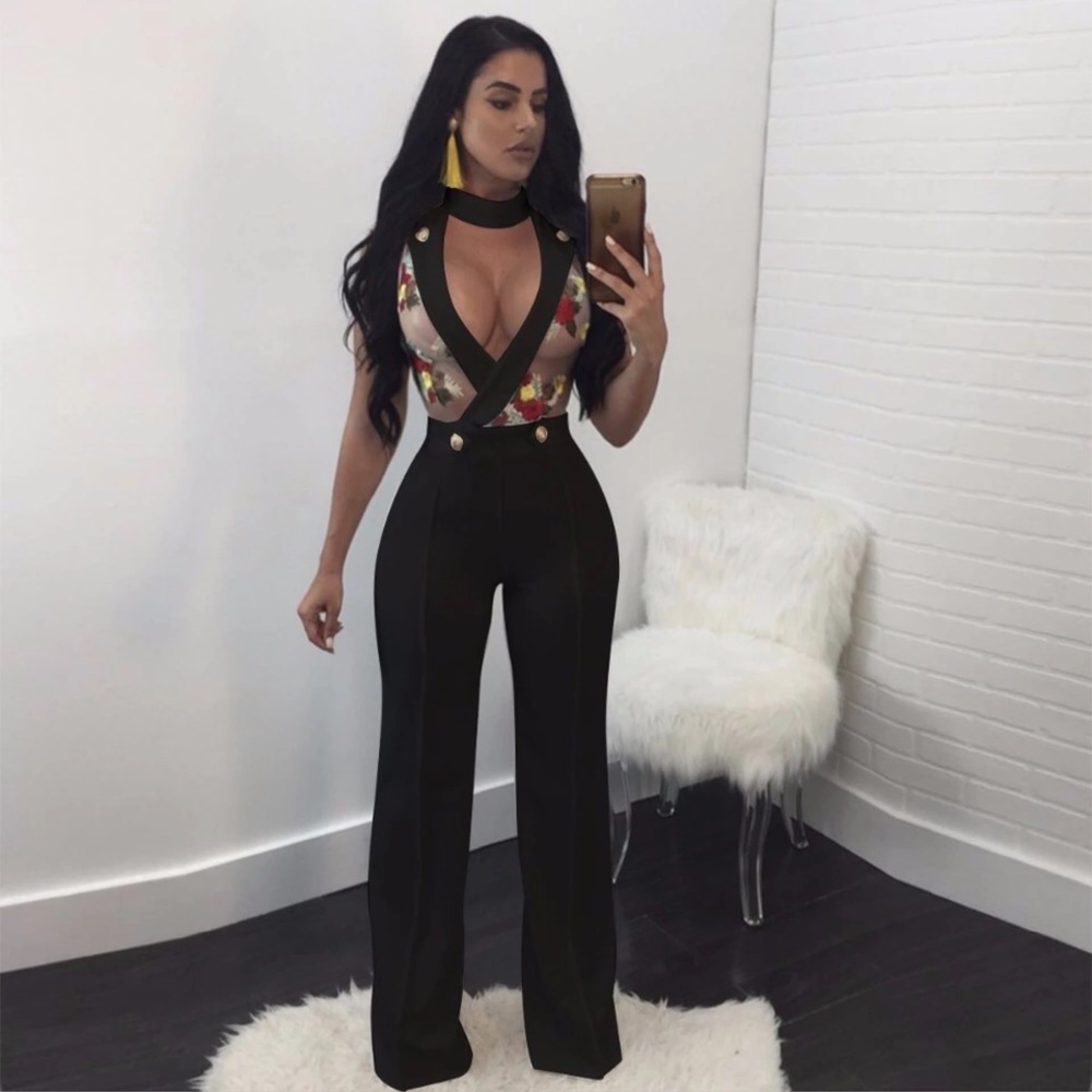 NWOT BLACK JUMPSUIT. Very sexy see through top.